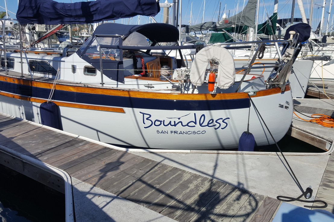 Naming, Nav Station tidy, VHF, fender covers, and finishing the scupper through-hull (busy&nbsp;week!)